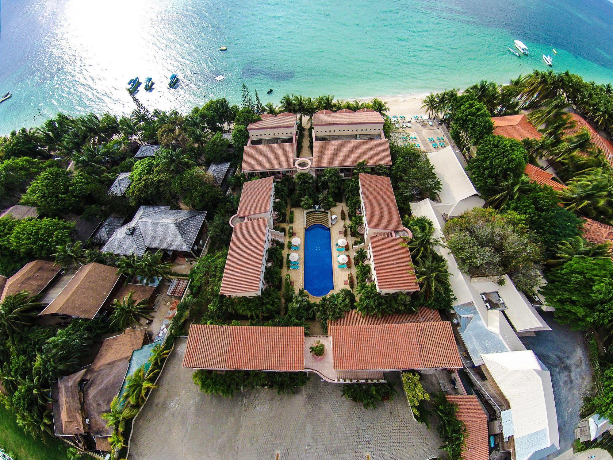 Las Sirenas Hotel And Condos West Bay Bagian luar foto